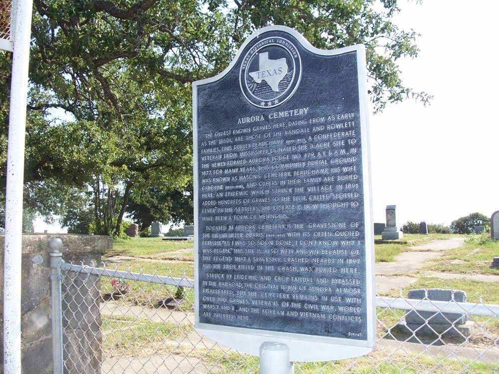 A Texas Historical Commission marker outside the Aurora Cemetery, alleged burial site of the UFO pilot, which briefly mentions the incident.